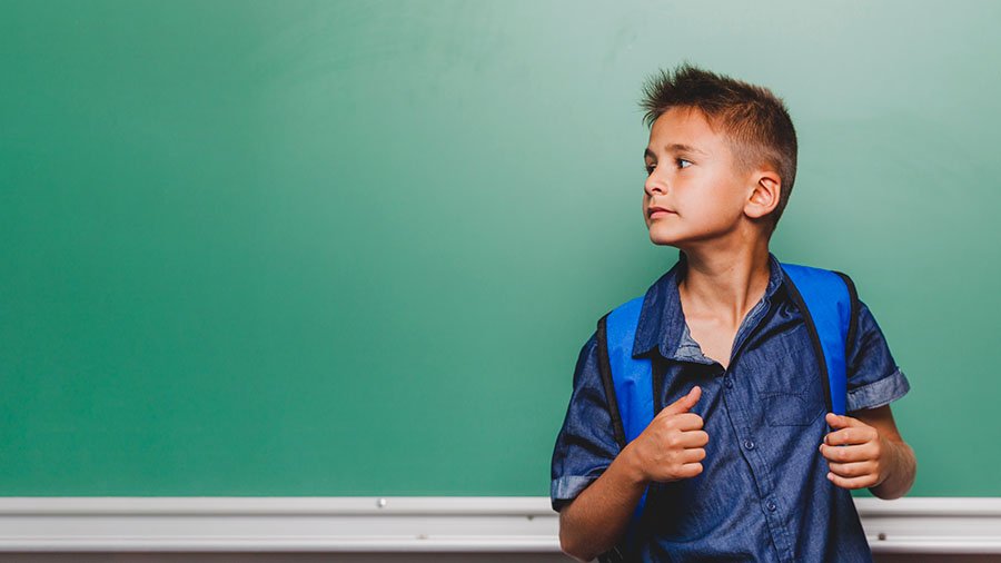 A confident pupil in the classroom